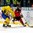 SPISSKA NOVA VES, SLOVAKIA - APRIL 20: Canada's Mackenzie Entwistle #26 plays the puck while Sweden's Adam Ginning #10 defends during quarterfinal round action at the 2017 IIHF Ice Hockey U18 World Championship. (Photo by Steve Kingsman/HHOF-IIHF Images)

